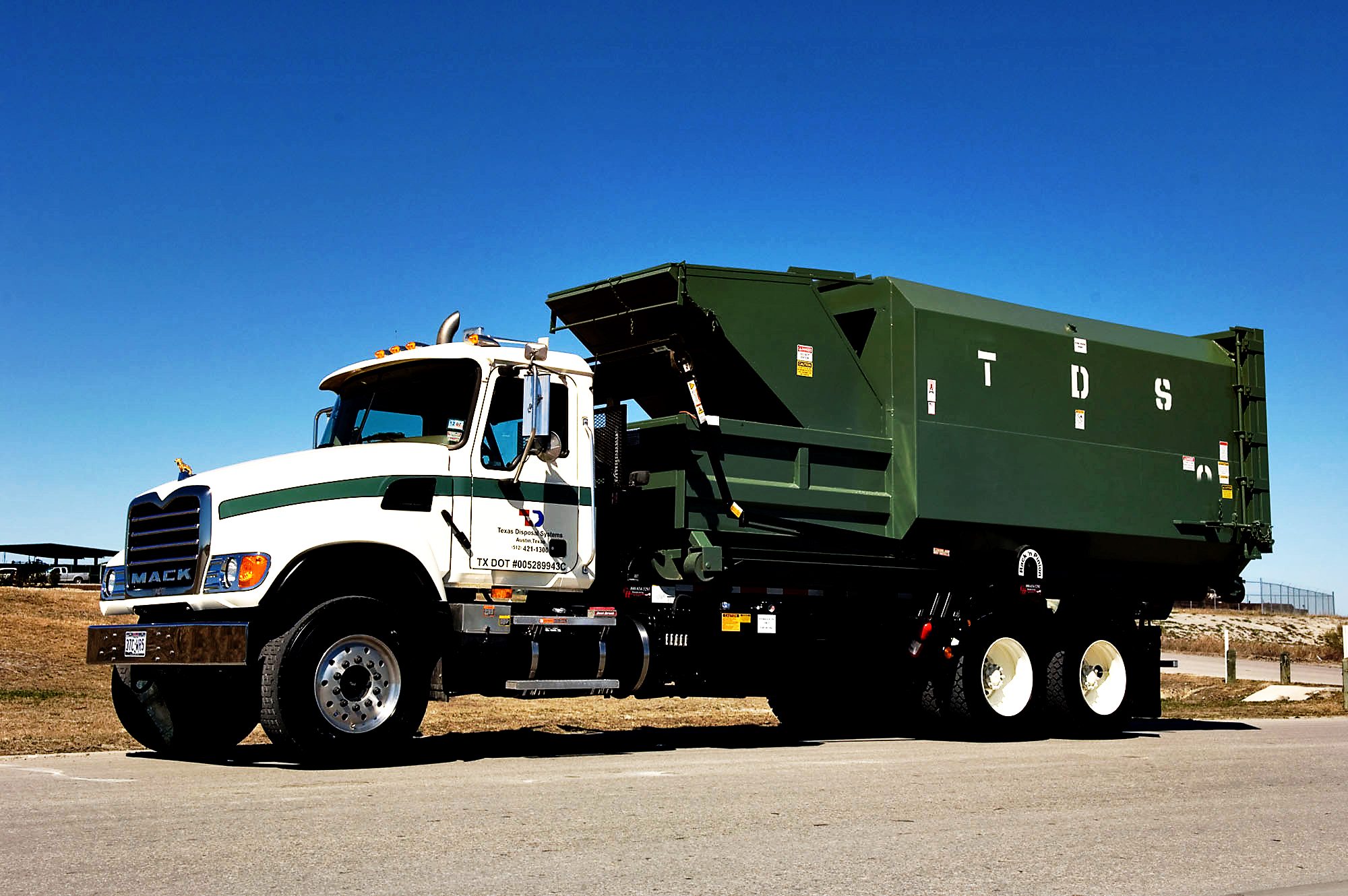 TDS compactor on truck
